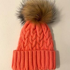 Salmon orange winter hat with removable fur pom